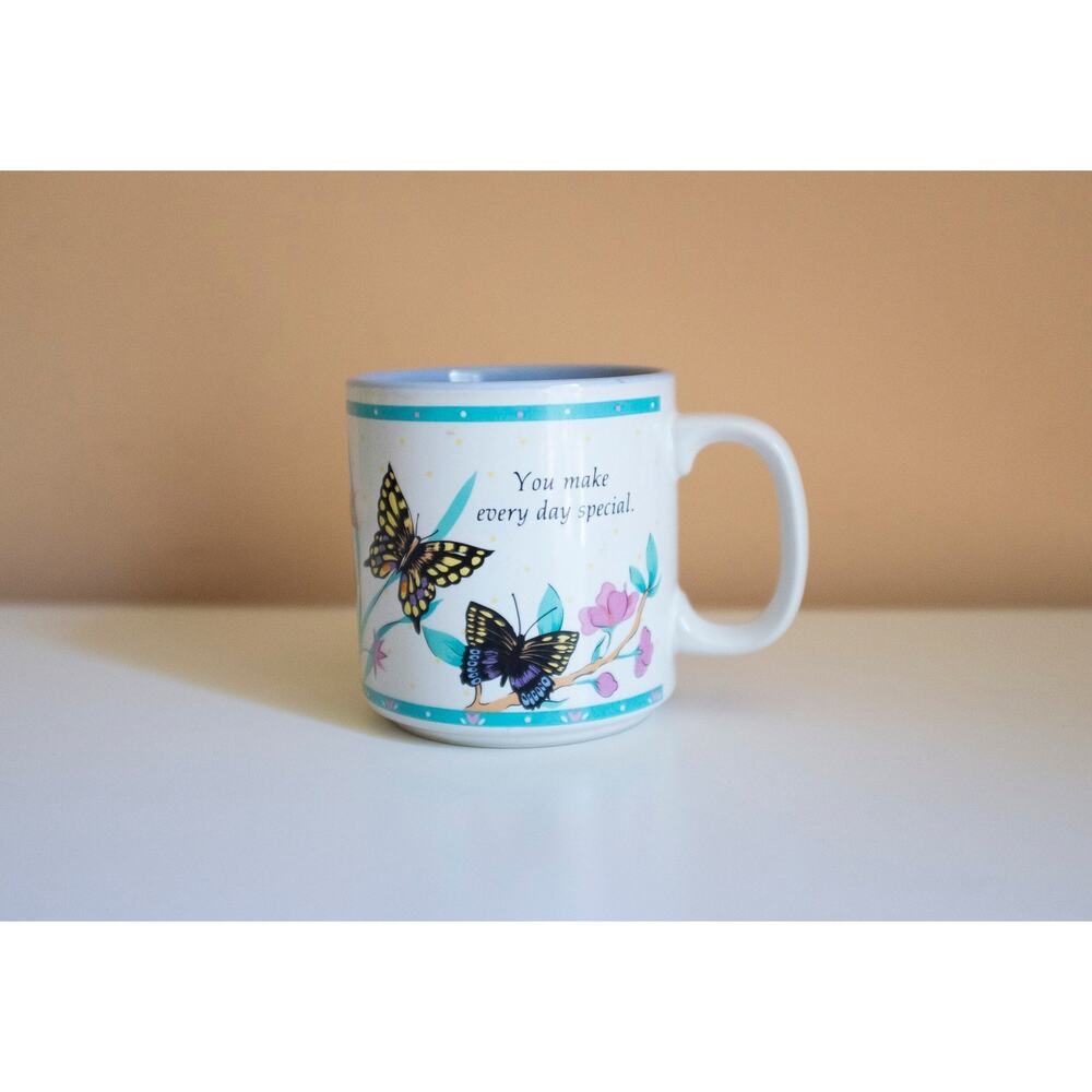 Vintage mug with butterflies that says "You make every day special"